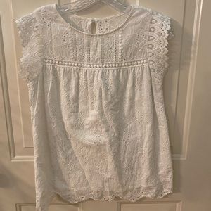White, lace blouse, size M.